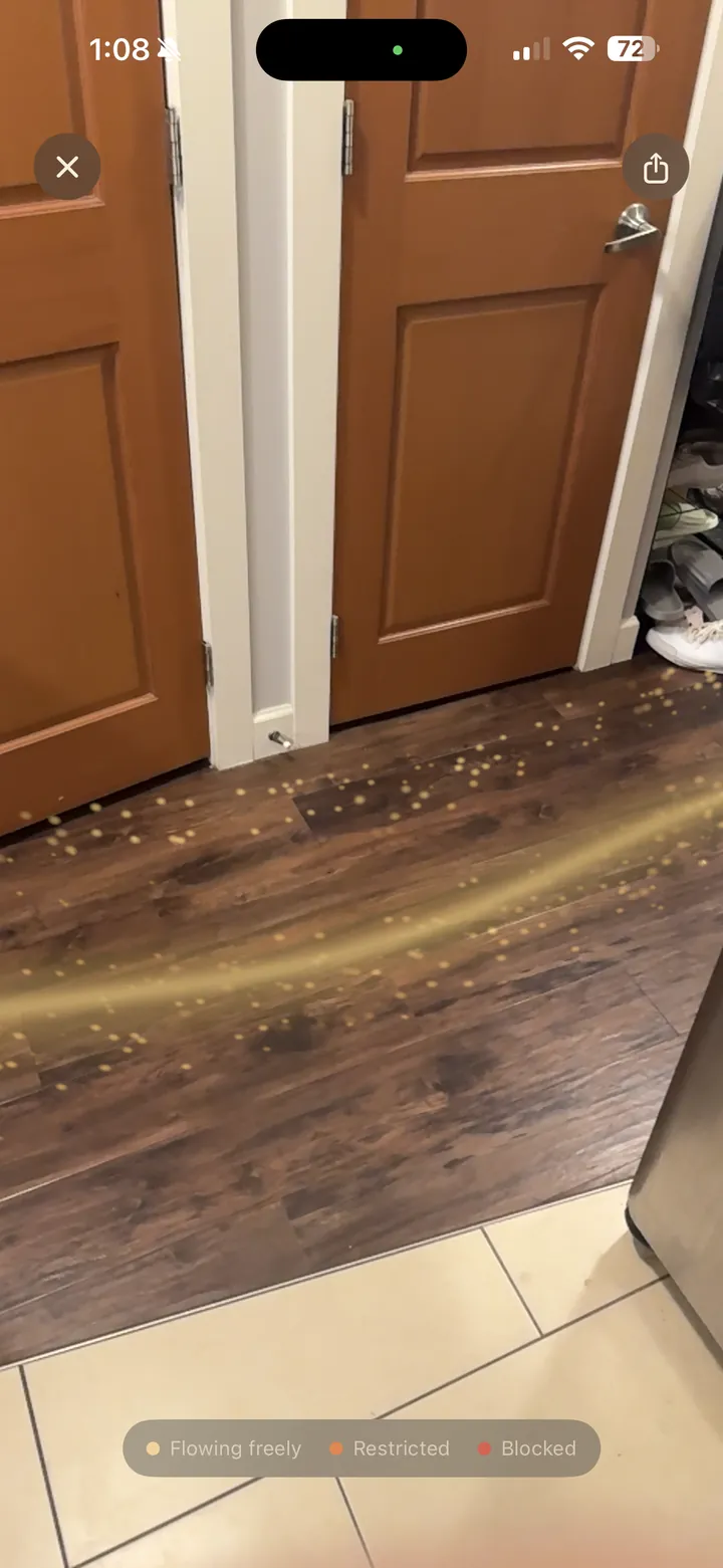 Feng Shui Scan showing the flow as moving light across a real floor in AR